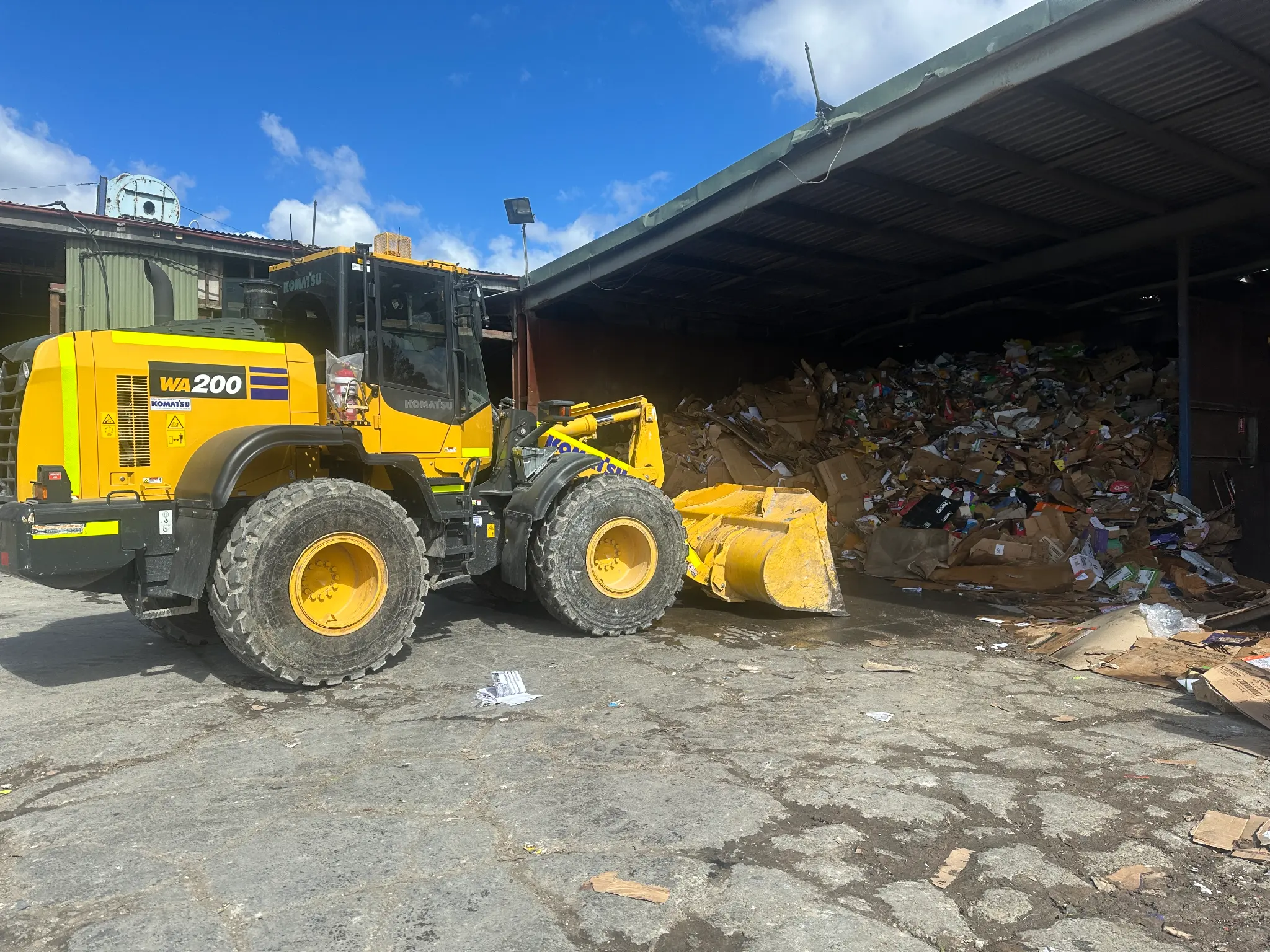 Scrap metal recycling with machinery at Shoalhaven Recycling